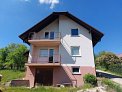 Front facade of three-story detached house with balconies and garage, Cankova Municipality